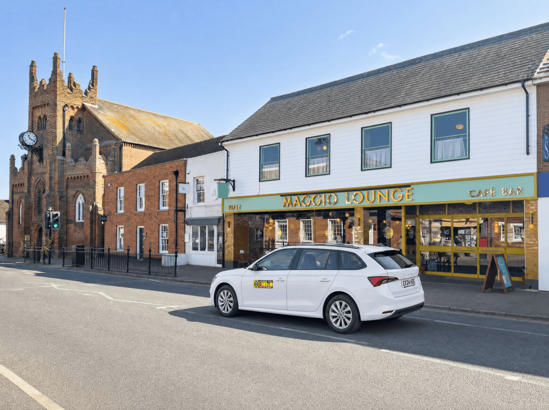 Local taxi driving through Billericay town centre